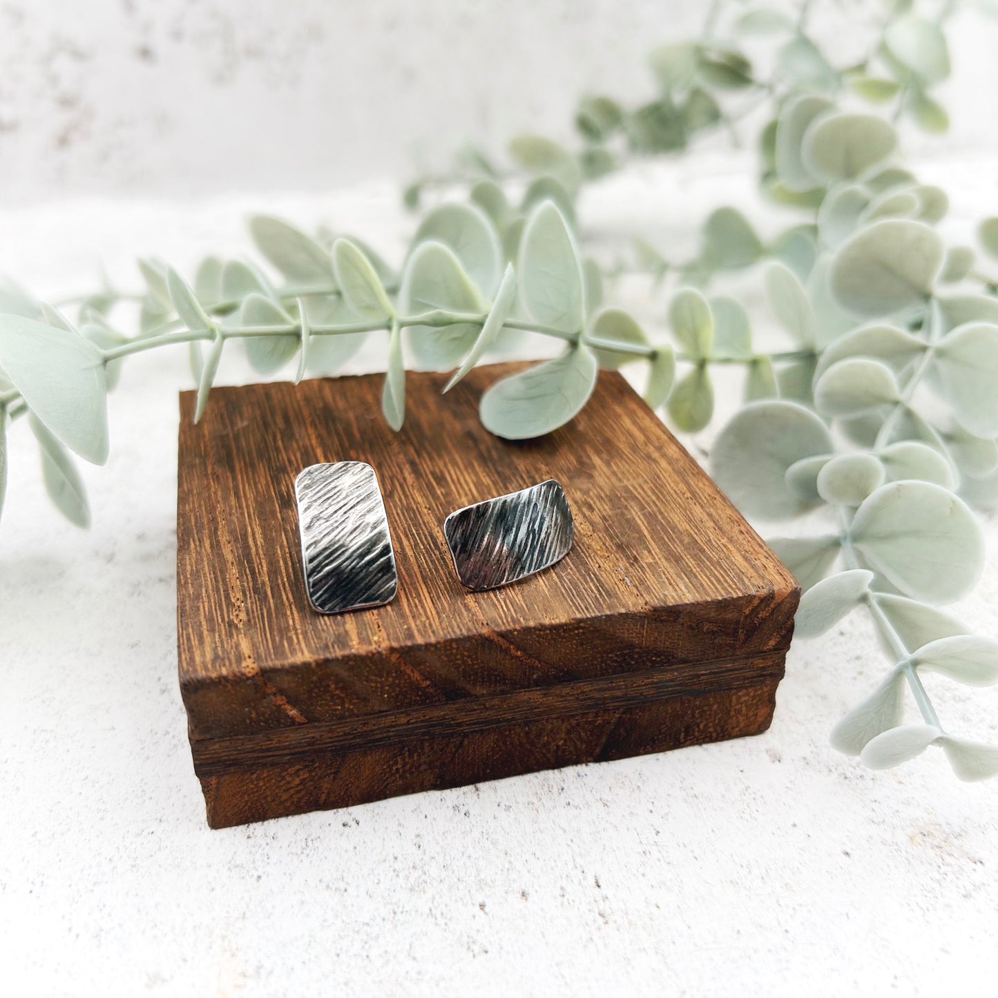 Sterling silver textured oblong studs