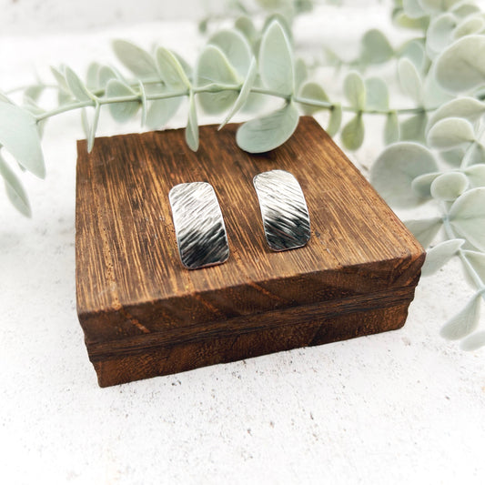 Sterling silver textured oblong studs