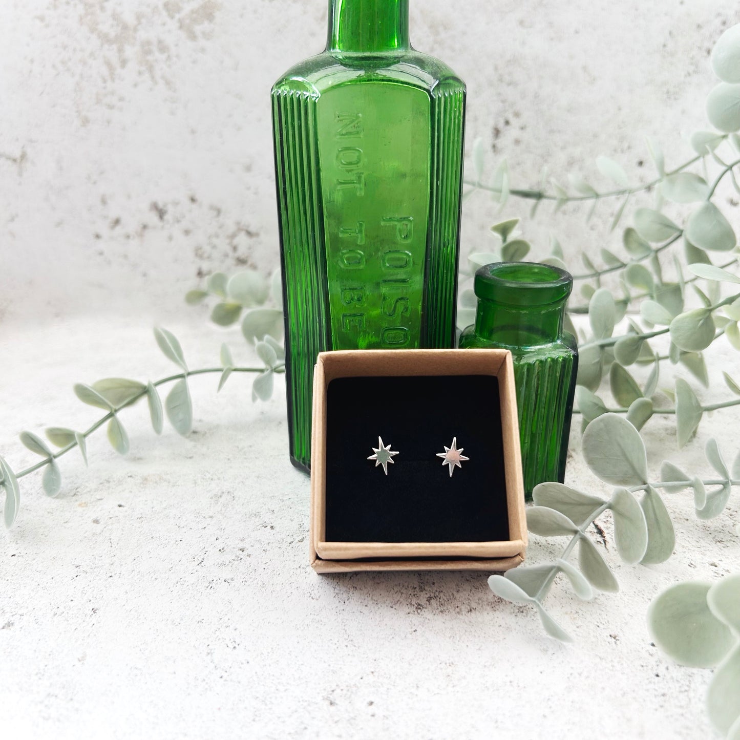 Sterling silver starburst earrings