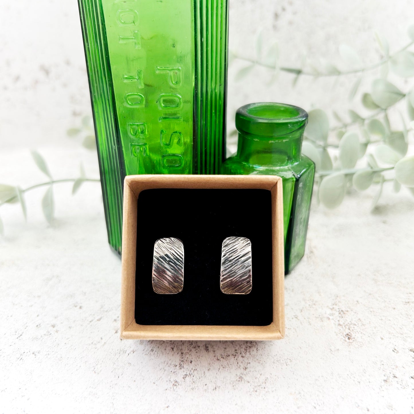 Sterling silver textured oblong studs