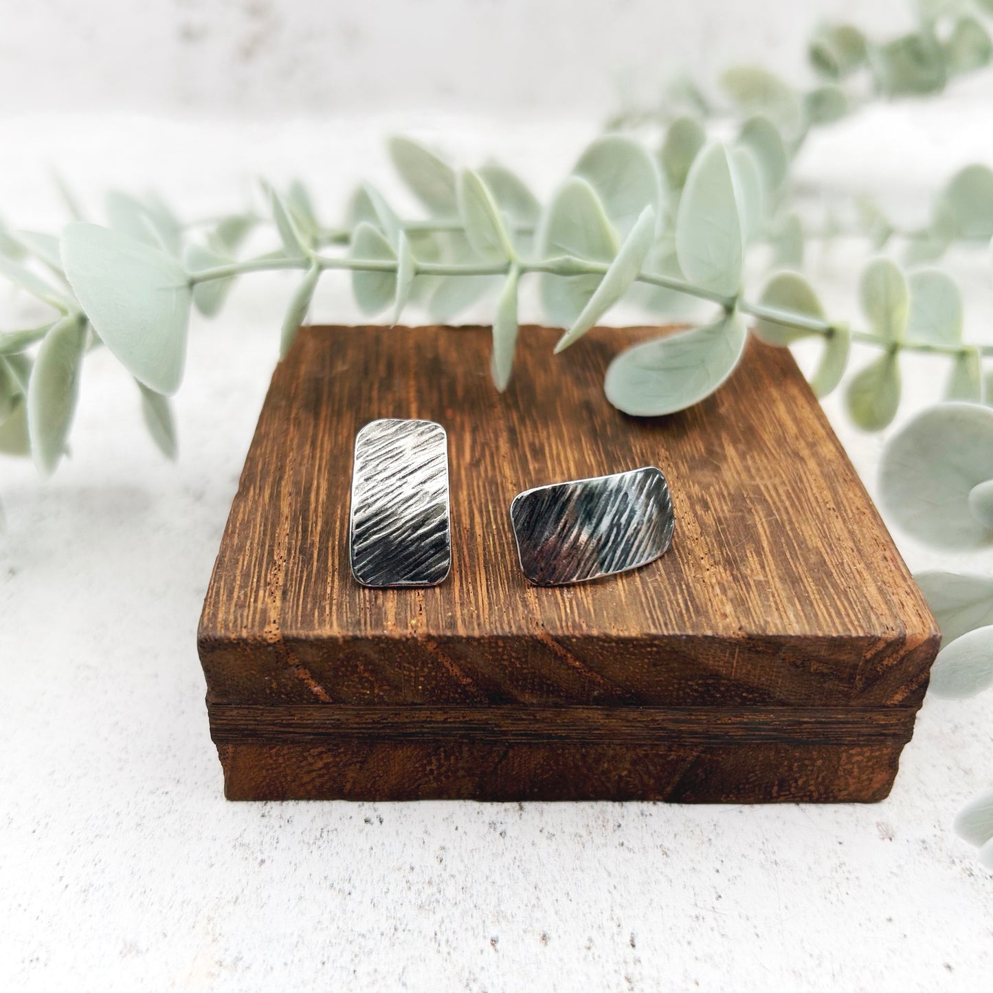 Sterling silver textured oblong studs