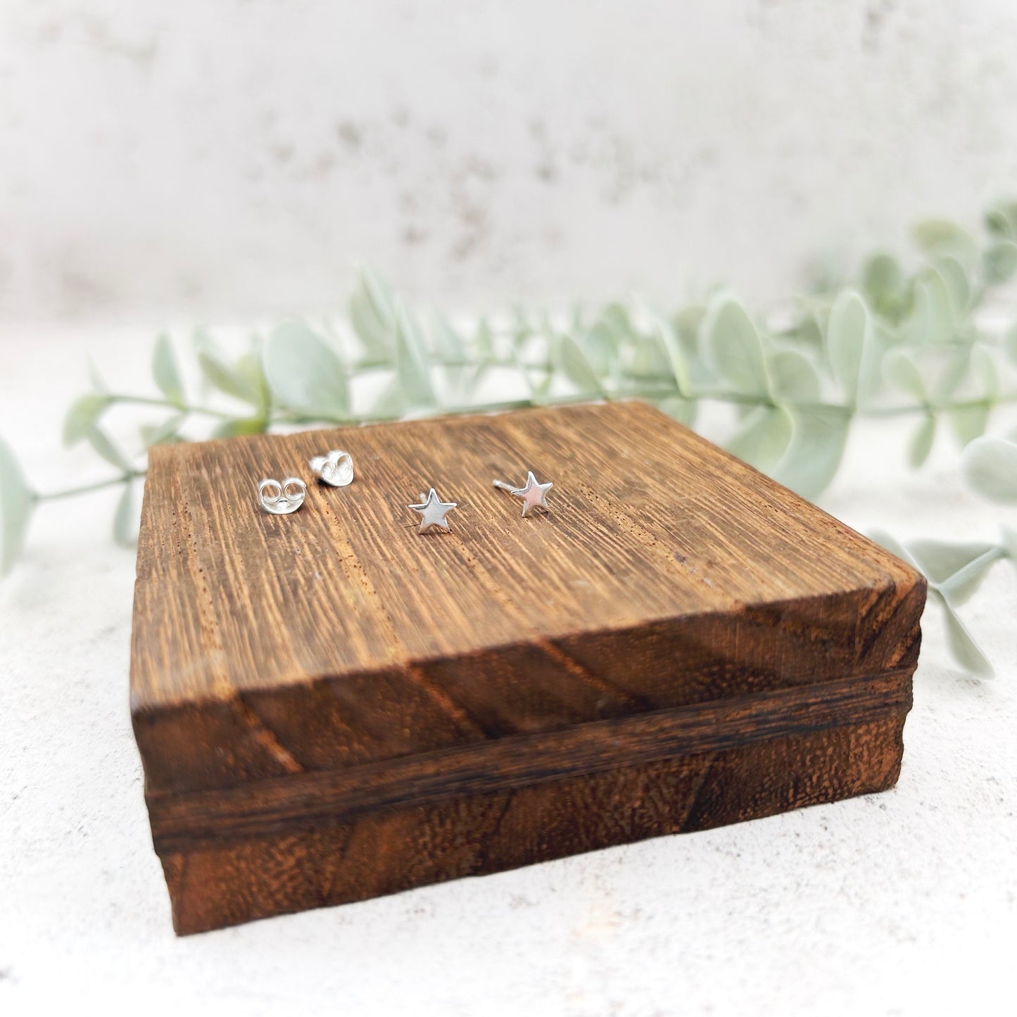 Mini sterling silver star earrings